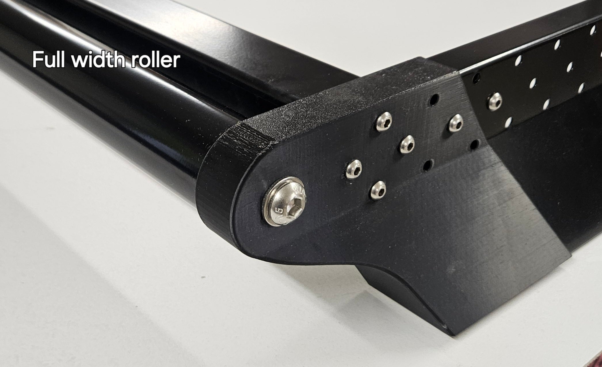 Close-up of a full-width roller mechanism for Vantage RV roof racks